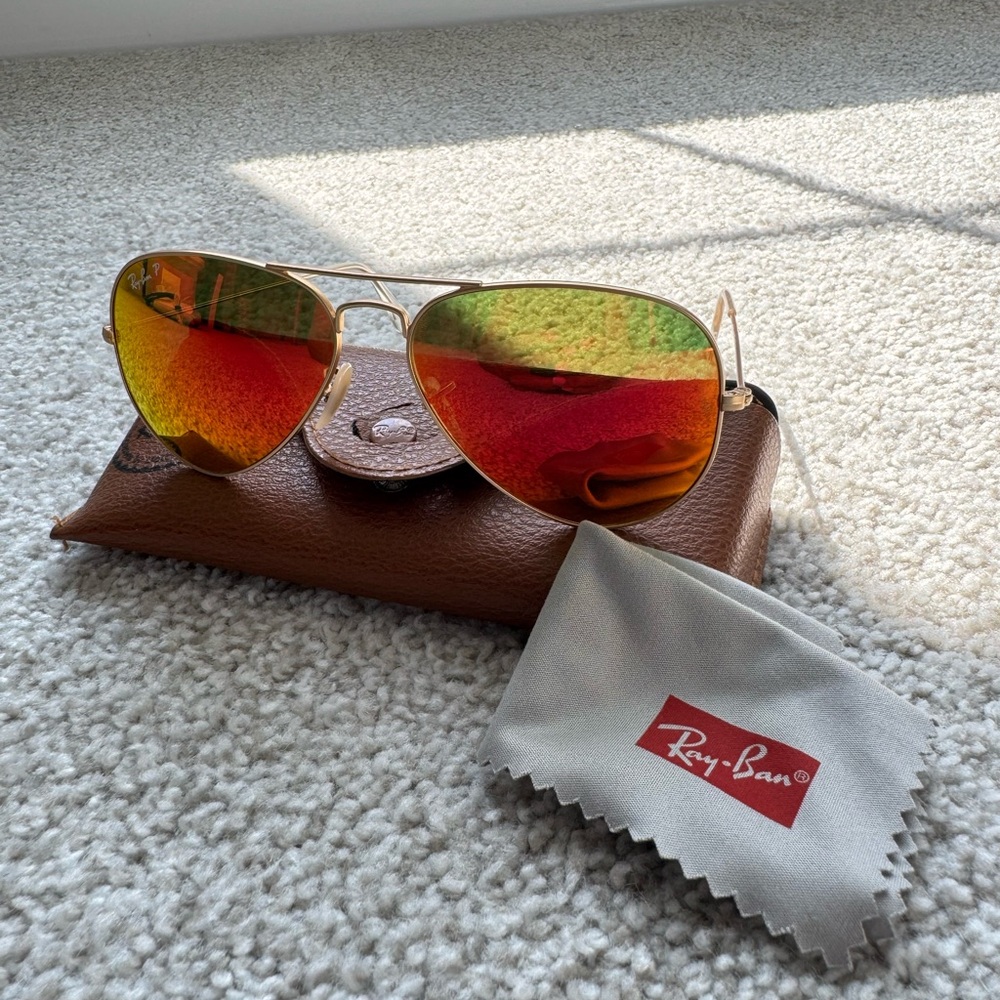 Women’s Ray-Ban Gold Frame Sunglasses with Red-Orange Lenses